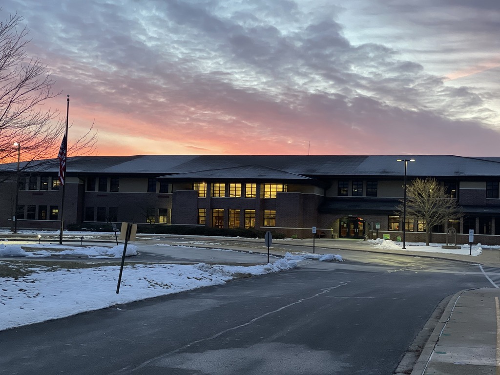 Prairieview Elementary Campus with Sunrise behind building