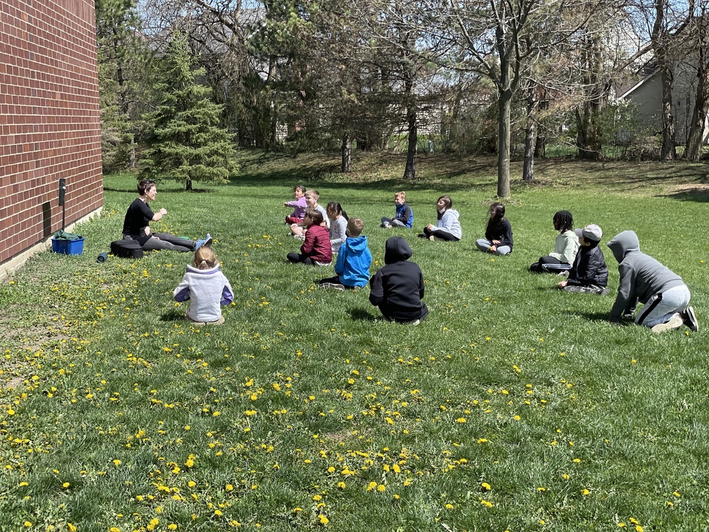 kids sitting on the ground