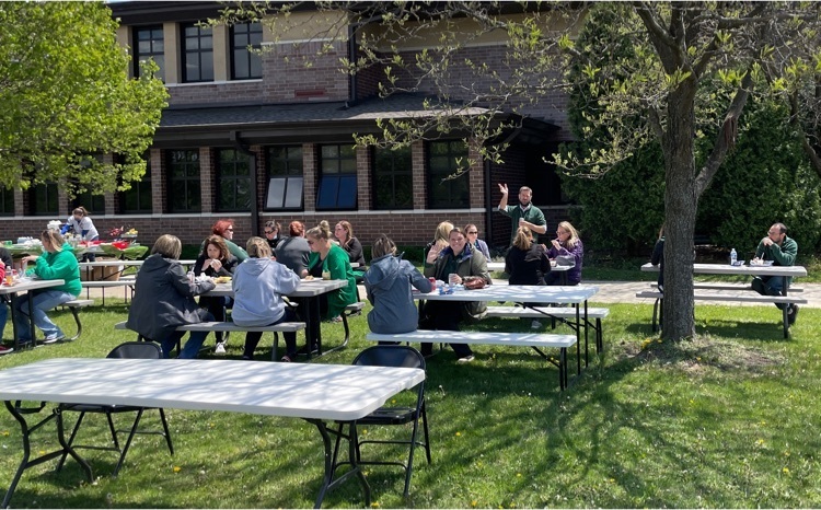 people at picnic tables
