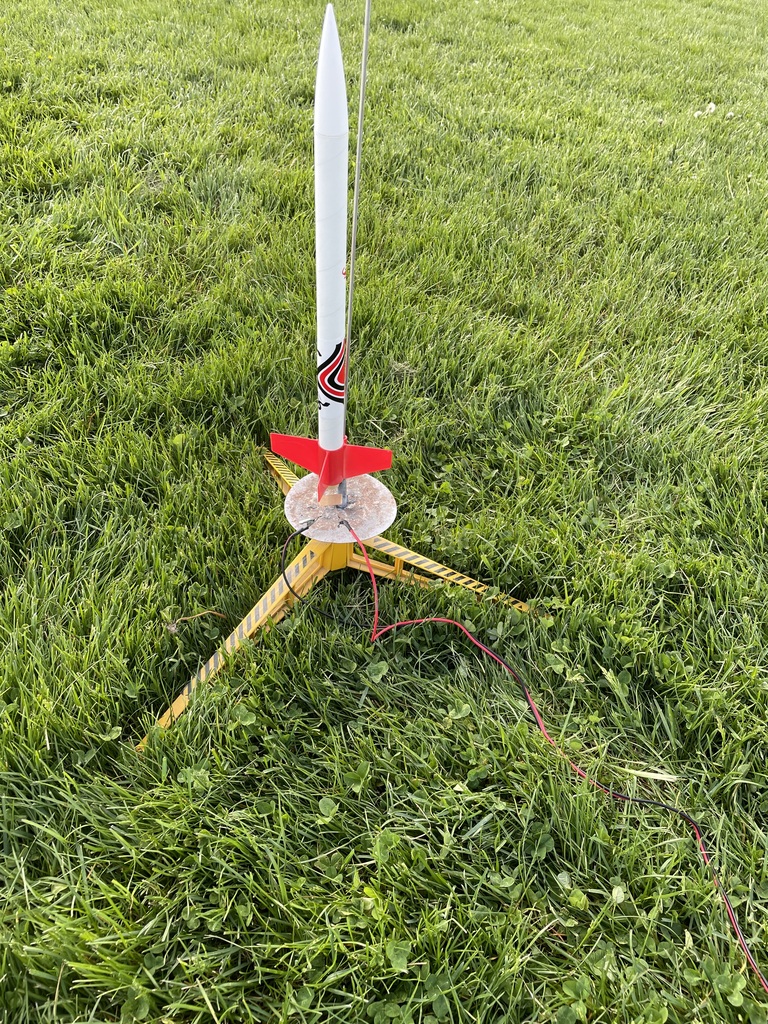 Model rocket connected to power souce. 