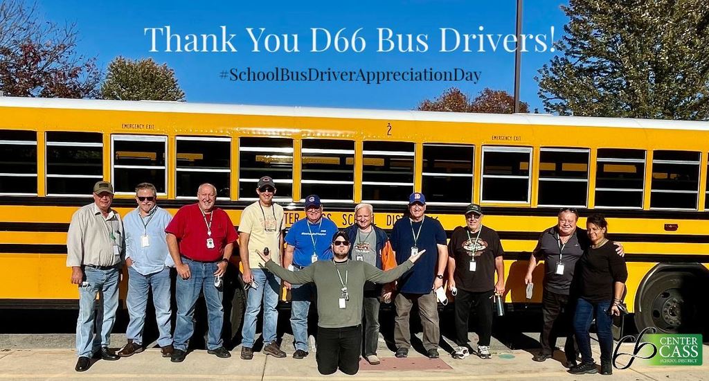 Bus drivers in front of bus that reads Thank you D66 bus drivers! #schoolbusdriverappreciationday