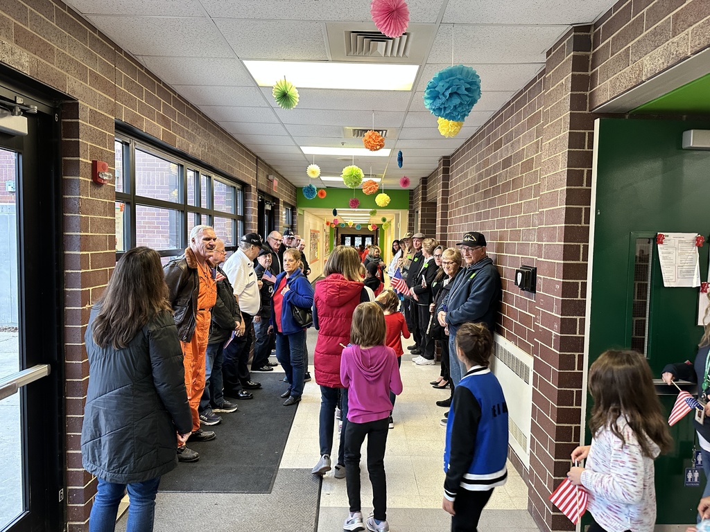 veterans and students in hallway