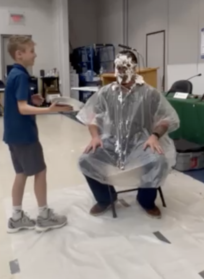 BOE member Brian L taking a pie to the face